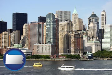 a New York City ferry and water taxi on the Hudson River - with Pennsylvania icon